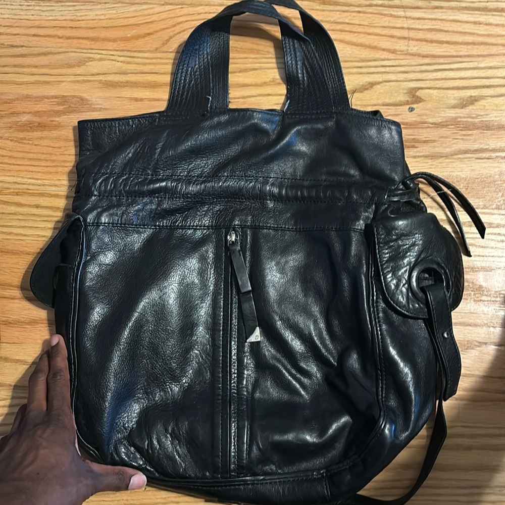 Black Francesco Biasia purse.